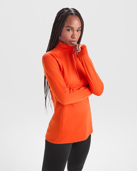 ESTAMBUL WOMAN Sweatshirt technique brossé ajusté avec une manche raglan et une demi fermeture à glissière inversée avec un détail réfléchissant